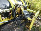 a yellow machine that is sitting on the ground
