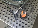 a bunch of wires that are on a metal table