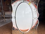 a mirror that is sitting on the floor in the room