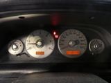 a close up of a speedometer in a car