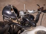 a close up of a motorcycle with a helmet on it