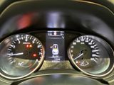 a close up of a car dashboard with various gauges