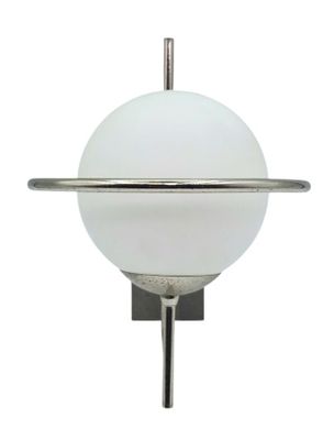 an image of a wall mounted light with a glass ball on it