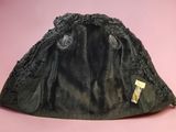 an image of a black hat with fur on it