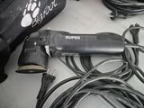 a cord cord and a cord cutter sitting on a table
