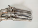 a pair of pliers that are on a table