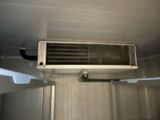 an air conditioner that is in the middle of a room