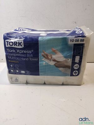 two rolls of toilet paper sitting on top of a white counter
