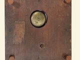 a clock that is on display on the wall