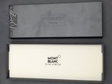 a black box with a white label on it and a black box with a white label on it