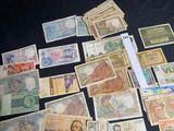 many different types of currency on the table