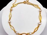 gold plated bracelet with pearl beads and chain