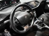 the interior of a car with a steering wheel and dashboard controls