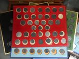 a lot of coins that are sitting on a table