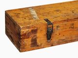 an old wooden box with a latch on it