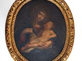 tableau représentant une femme tenant un bébé dans ses bras, dans un cadre doré