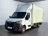 a white van that is parked in a large room