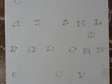 a sheet of paper with letters and numbers written on it