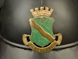 a close up of a helmet with a crest on it