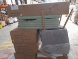 a stack of boxes and a chair in a warehouse