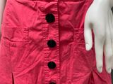 pink skirt with buttons on a mannequin mannequin mannequin mannequin mannequin mannequin mannequin mannequin manne