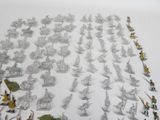 a lot of warhammer figurines on the table