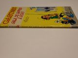 a yellow book with a picture of a cartoon character on it