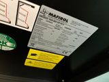 a sign on the back of a bus that says metro