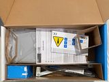 a cardboard box with a bunch of items inside of it