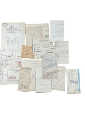 several old papers are piled together on top of each other