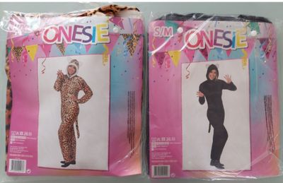 two packages of costumes on display on the table