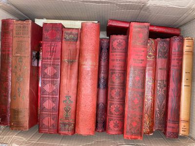 a box full of old books sitting on a table