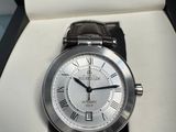 a watch that is in a box on the table