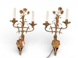 pair of antique wall sconces with flowers and leaves