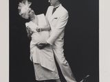 black and white photograph of a man and a woman dancing in a dance pose