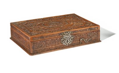 an image of a wooden box with carvings on it