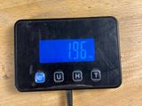 a digital clock that is on the table