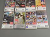 a lot of nintendo wii games on the table