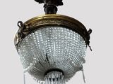 a chandelier hanging from the ceiling in the room