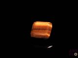 an image of a wooden object in the dark