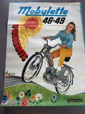 a poster of a woman riding a motorcycle on the street