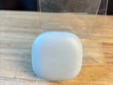 a close up of a soap bar sitting on top of a wooden table