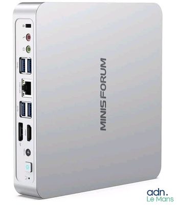 a close up of a small white device with a usb