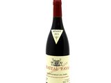 a bottle of wine that is sitting on a table