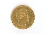 an image of a gold coin with a man ' s face