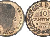 a close up of a coin with a woman ' s face on it
