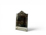 an image of a mirror with a picture of a dog in it