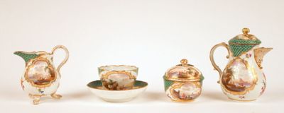 three pieces of porcelain on a white surface