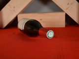 a bottle of wine that is sitting on a table