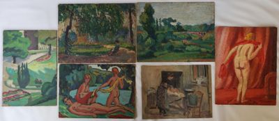 de nombreux tableaux accrochés aux murs d'une pièce
